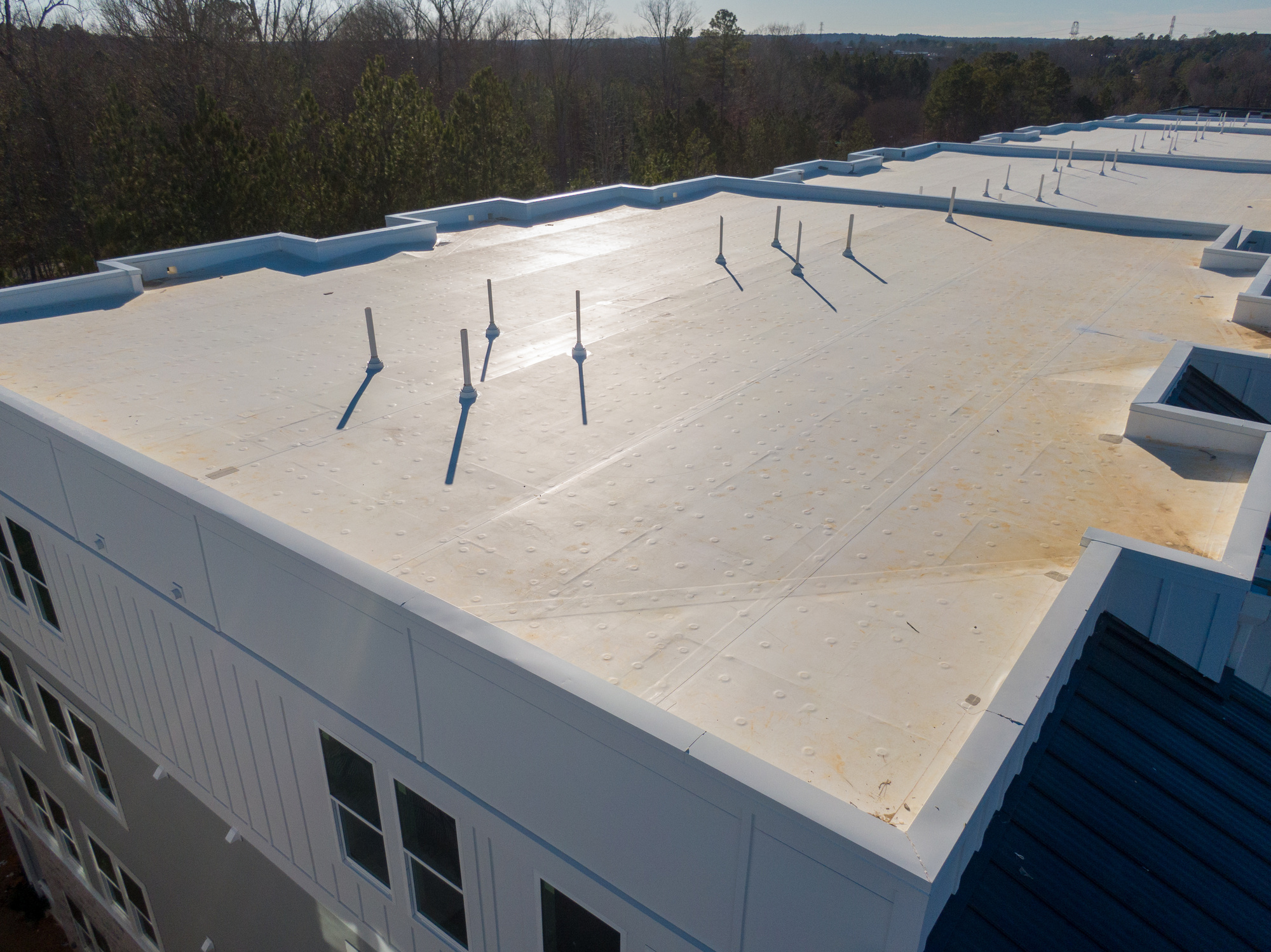 White flat roof on a commercial building