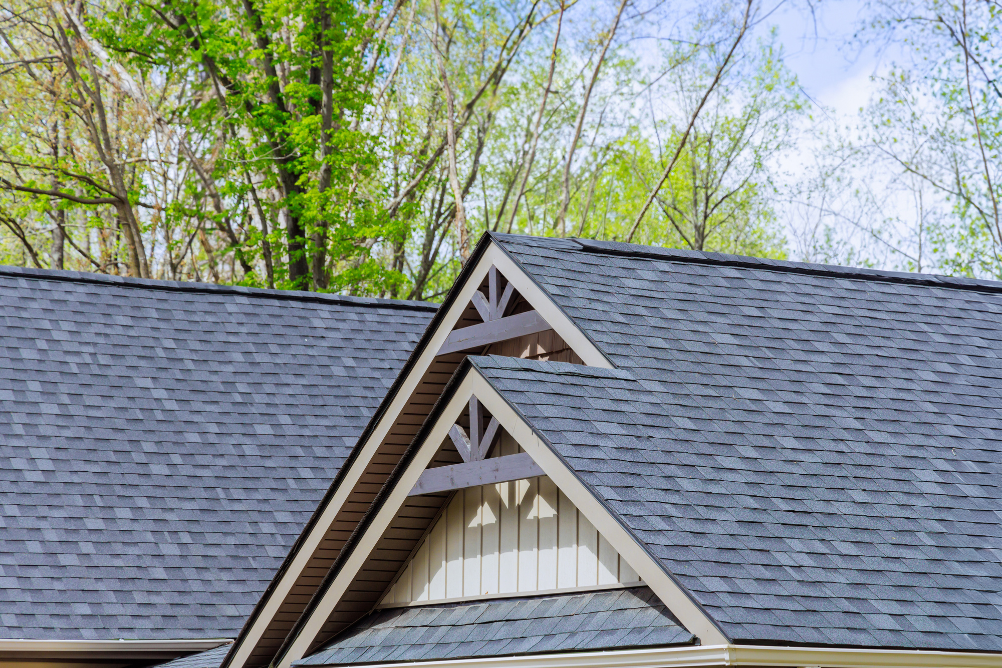 New asphalt shingle roof on a house