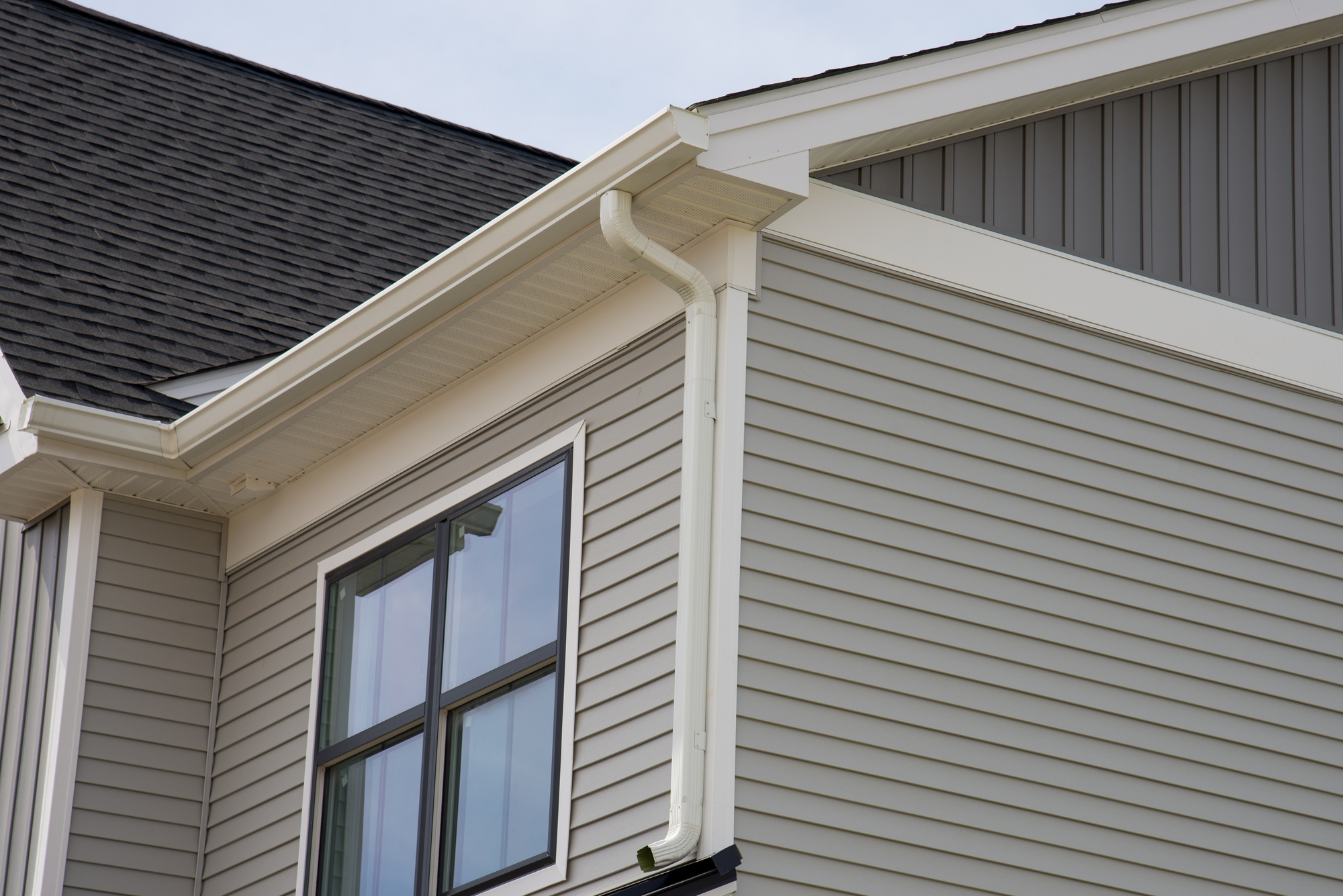 Gray siding on a two-story building