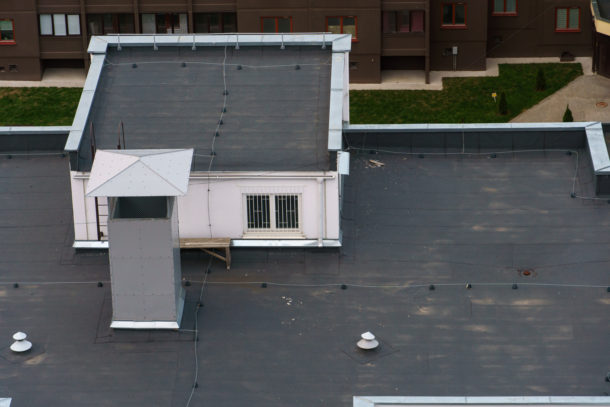 Black flat roof on a commercial building
